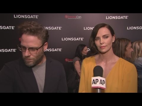 Charlize Theron and Seth Rogen refuse to discuss politics on the red carpet for their campaign-set rom-com "Long Shot." (April 5)