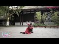 Young kung fu master demonstrates fan skills