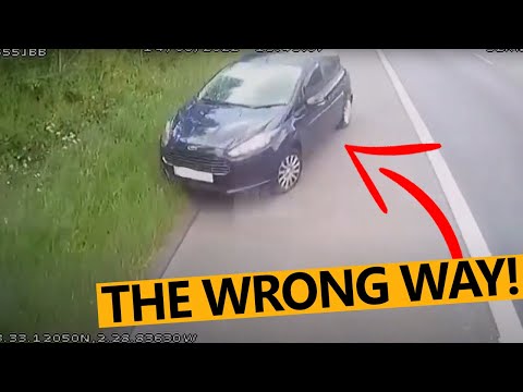 Car goes wrong way down motorway M61