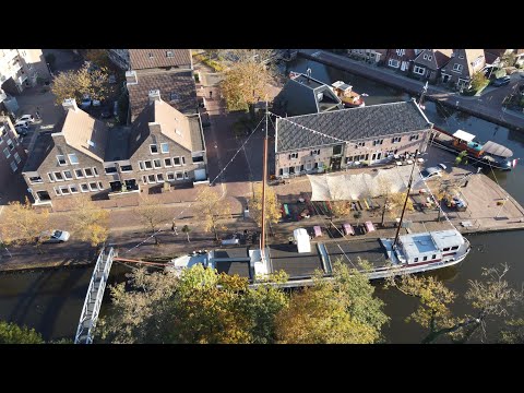 Meppel - een drone vlucht over en langs mooie gebouwen, plekjes en buurten in Meppel! 1080P