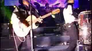 La Dama Lyrics English Translation