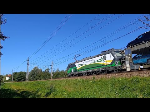 Aufeinandertreffen:Vectron mit Autozug und Staubsauger mit Wendezug ( 193 235-9 und 1144 210-2 )