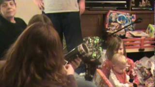 preview picture of video 'Kids enjoying opening christmas presents, 2009.'