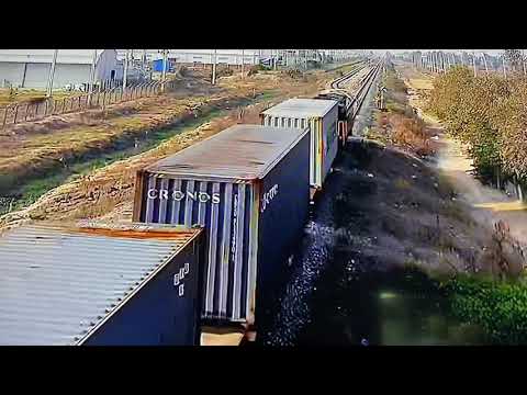 43 wagon train passing pk 22 with 21 container wagons and 22 Tank  Tainers   1653. 7/3/20