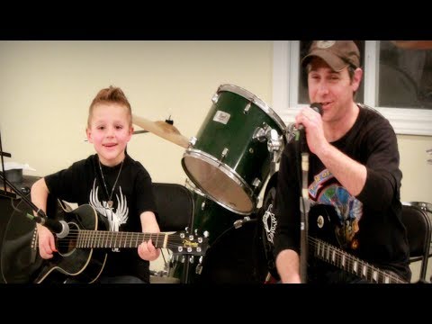 Chris Machete performs Bad Moon Rising with his 5 year old student