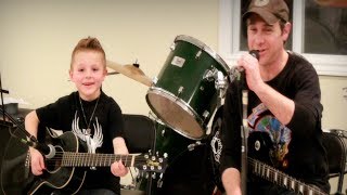 Chris Machete performs Bad Moon Rising with his 5 year old student