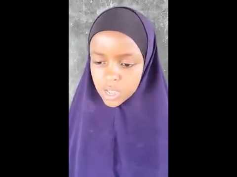 A small girl from somalia reciting surah at-tawba