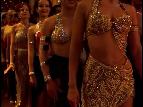 Trailer frame hinting at Vegas competition lights where samba and mambo cues spike