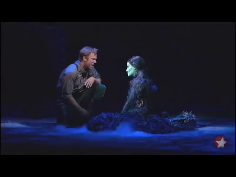 Idina Menzel and Norbert Leo Butz performing song As Long As You’re Mine