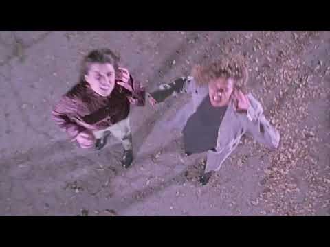 Trailer montage: the coven’s ritual on the beach as waves crash and candles gutter