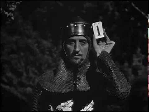 Basil Rathbone Tries On Different Helmets