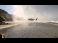 Military helicopter makes emergency landing on San Diego beach.