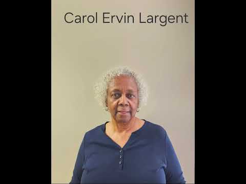 Carol Largent attended Mountain View Elementary School from kindergarten to fourth grade. In 1965, she was moved to Hillcrest Elementary, a formerly all-white school, for fourth grade. She was raised by a single mother who worked as a domestic laborer, cooking, cleaning, and catering. She grew up in a small neighborhood on a gravel road surrounded by her large extended family. Even though Hillcrest was the school closest to her home, she had never seen it. As a child, all she knew about desegregation was it meant going to a different school, a school she had never seen. She recalls her uncle "piling all of us in the car and driving us over to Hillcrest so we could see the school."