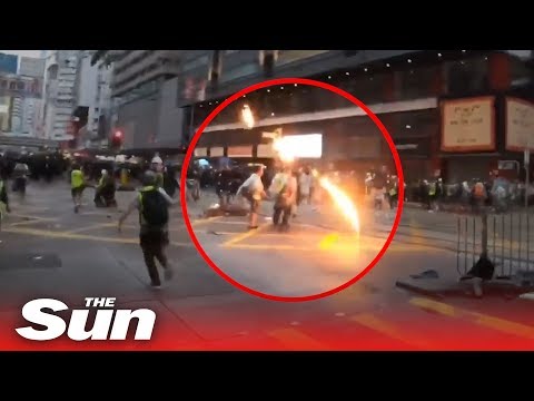 Hong Kong reporter gets hit by a petrol bomb