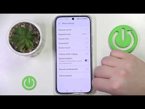 How do I enable or disable touch vibration on the HUAWEI Nova 13?