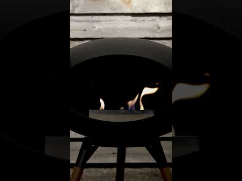 vasque-feu-métal-mur-béton-maison-bois-verre