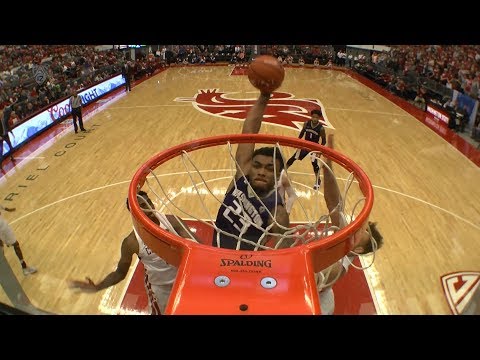 Highlight: Washington men's basketball's Carlos Johnson thrills with this crossover dunk