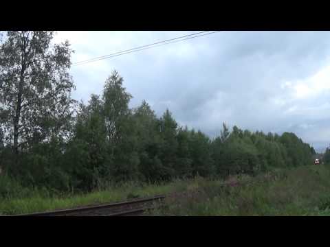 Finnish museum train  V12925 passes a level crossing !!!