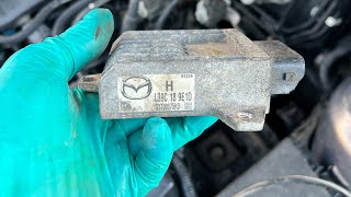 08 Mazda 3 TCM location and removal