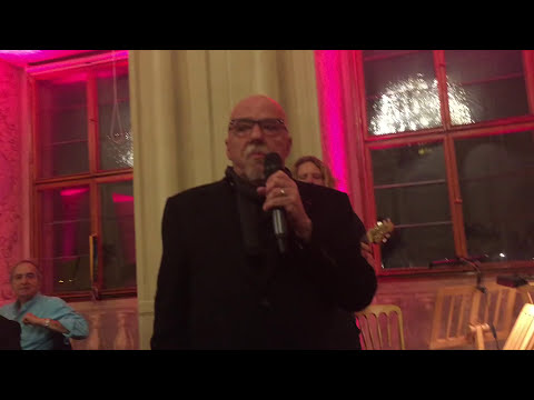 Paulo Coelho Singing with Christina Oiticica all we need is love.