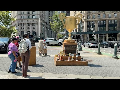 Video Thumbnail: Satirical gold trophy mocking Trump appears in New York | AFP