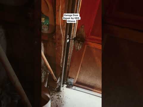 Wooden garage door repair — GDS Ottawa