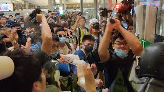 video: Beijing 'preparing tanks at Hong Kong border', warns Trump as protesters clash with police at airport