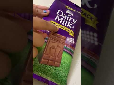 Opening Cadbury Dairy Milk Champion's chocolate bar