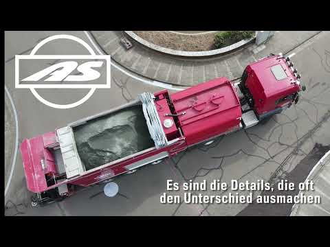 DSK (Dünne Asphaltdeckschicht in Kaltbauweise) in einer Kreuzung. AS Asphaltstraßensanierung