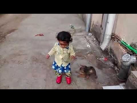 Spruha playing with puppy