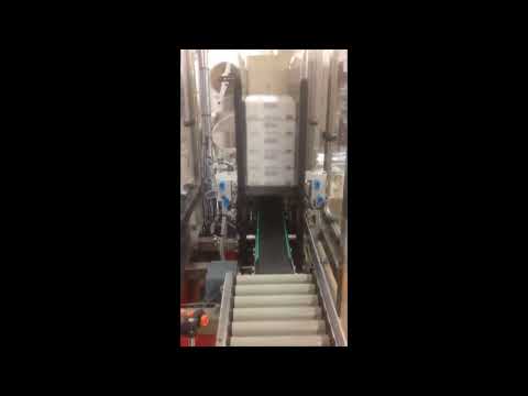 Empileur séquentiel de produits à fond plat et rigide par retenue verticale_2