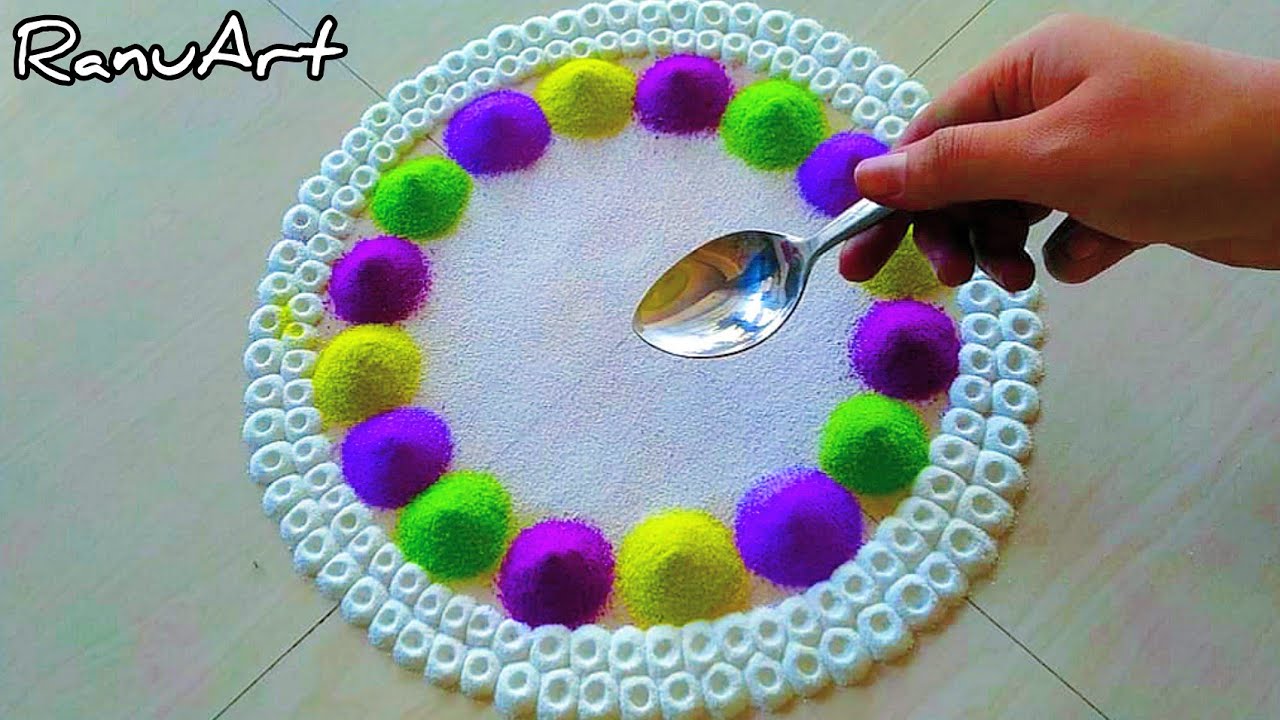Colorful rangoli design and peacock rangoli design by ranu art