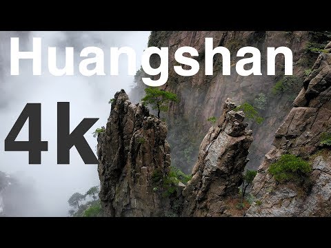 Flying over Yellow Mountains in China (4K drone footage)