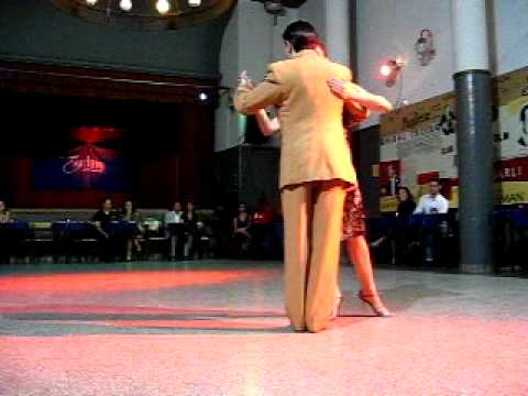  Paola Tacchetti  and  Alejandro Hermida  are  dancing  to  a  tango