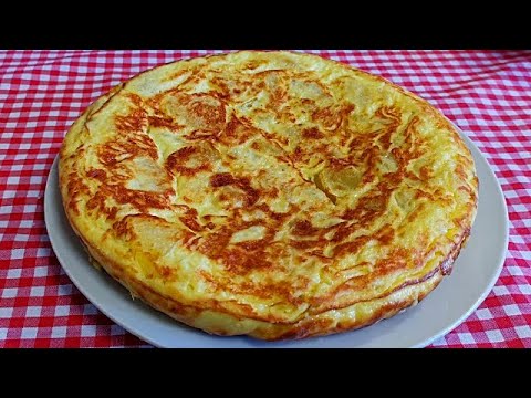 Como cocinar/Tortilla de patatas Española/con cebolla/La Tapa mas deseada(A mi manera)