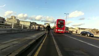 BMXs riding the wrong way over Waterloo Bridge