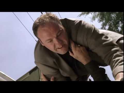 Tony beats Mikey Palmice with a stapler