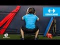 How To Do Wall Ball Squats | Exercise Guide