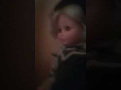 one of my dolls in a green dress zanini and Zambelli doll collection made in Italy