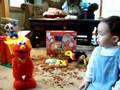Caden With His Tickle Me Elmo Doll Christmas 2007