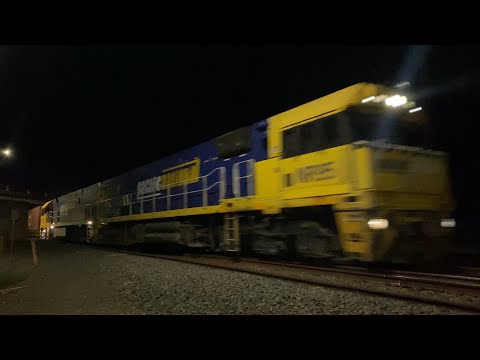 Up 1PM5 Pacific National freight with NR95 and NR114 at Gheringhap loop at night 2/4/2025