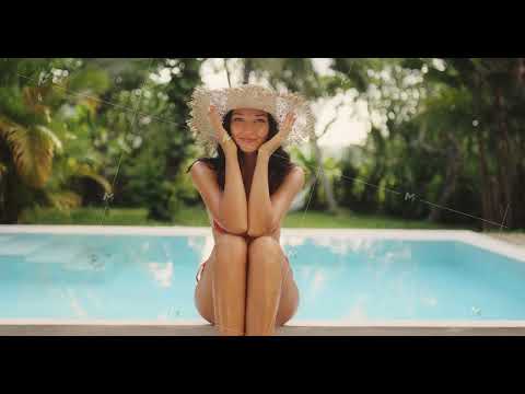 Smiling Woman In Straw Hat Sitting Poolside On Sunny Tropical Vacation