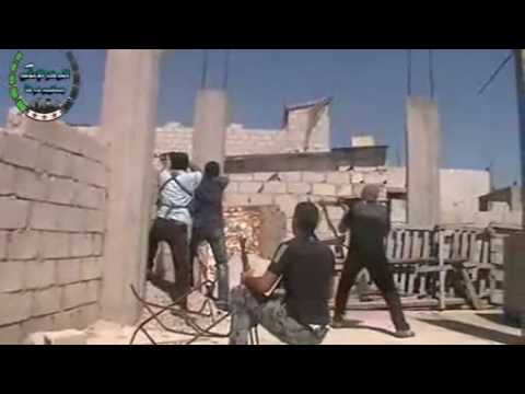 اشتباكات بين كتائب الجيش الحر وقوات النظام على حاجز المؤسسة العامة في مخيم درعا