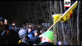 Protesters chain themselves in path of nuclear waste train