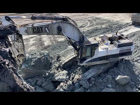 Caterpillar 375 Excavator Loads 4-Axle Trucks Non-Stop At Massive Coal Mining Site