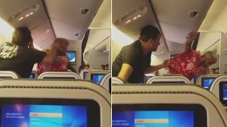 Shocking Video Shows Two Passengers Fighting on Pl