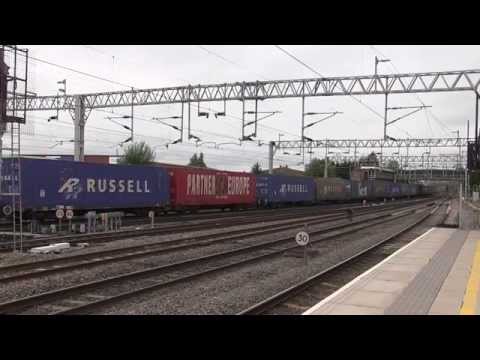 Freightliner Class 90 035 & 90 024 double-head an intermodal as it approaches Stafford Station