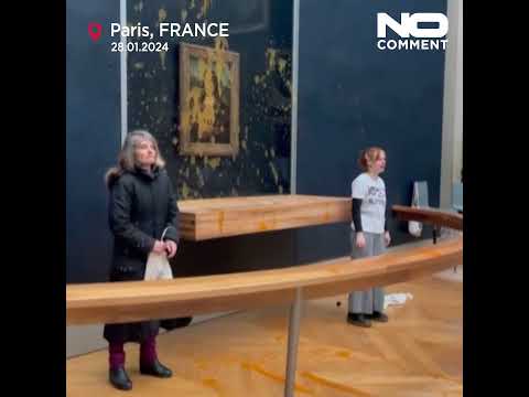 Video Thumbnail: Climate activists throw soup at glass protecting Mona Lisa painting at the Louvre Museum in Paris
