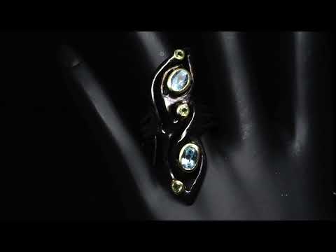 Серебряное кольцо с натуральным Топазами и Перидотами 19р видео