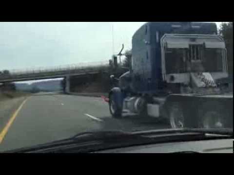 OVERSIZED LOAD CATERPILLAR D9R BULLDOZER BEING TRANSPORTED ON THE PENNSYLVANIA TURNPIKE.